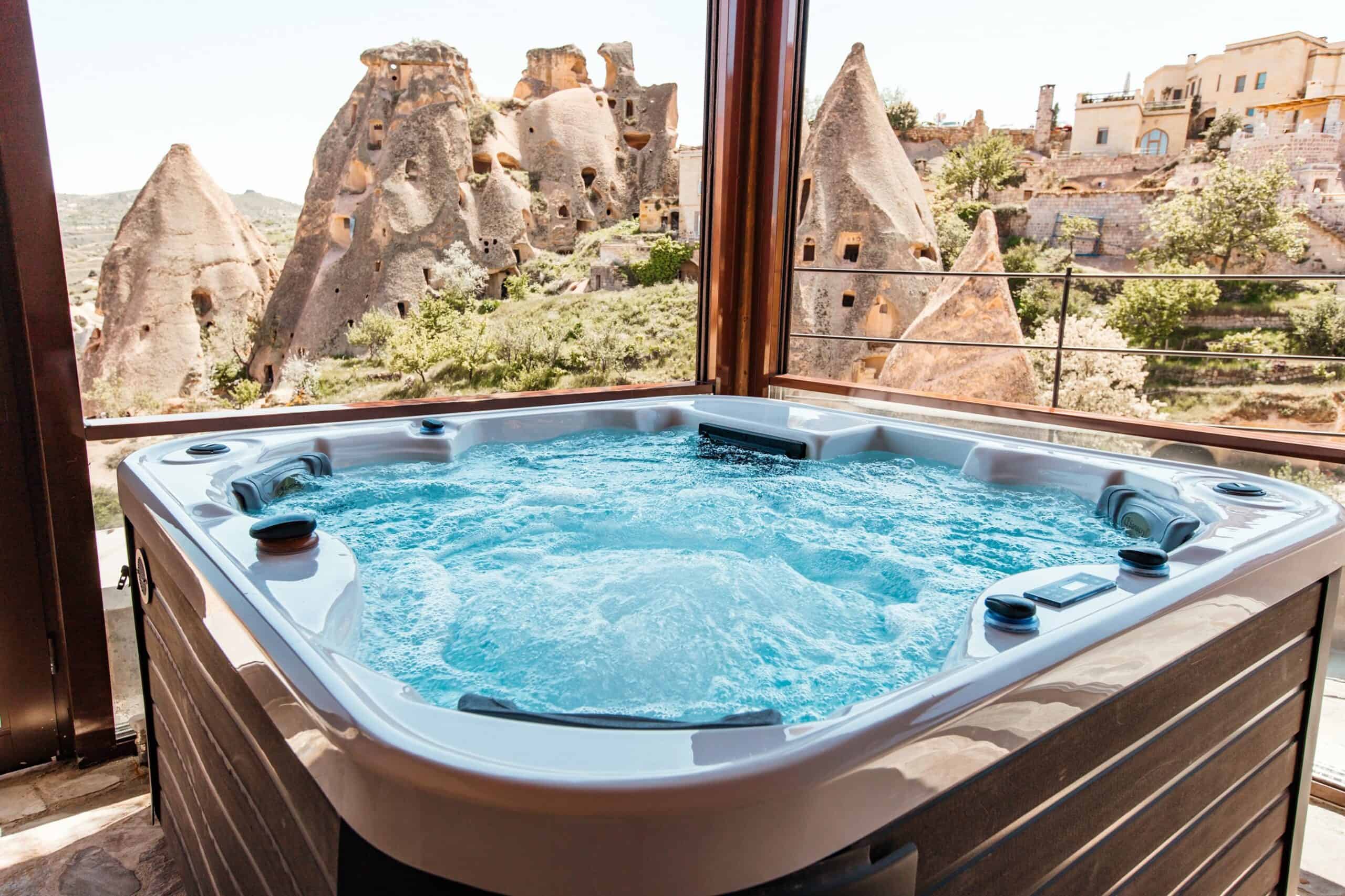 Suite With Hot Tub: hot tub on a terrace overlooking the fairy chimneys
