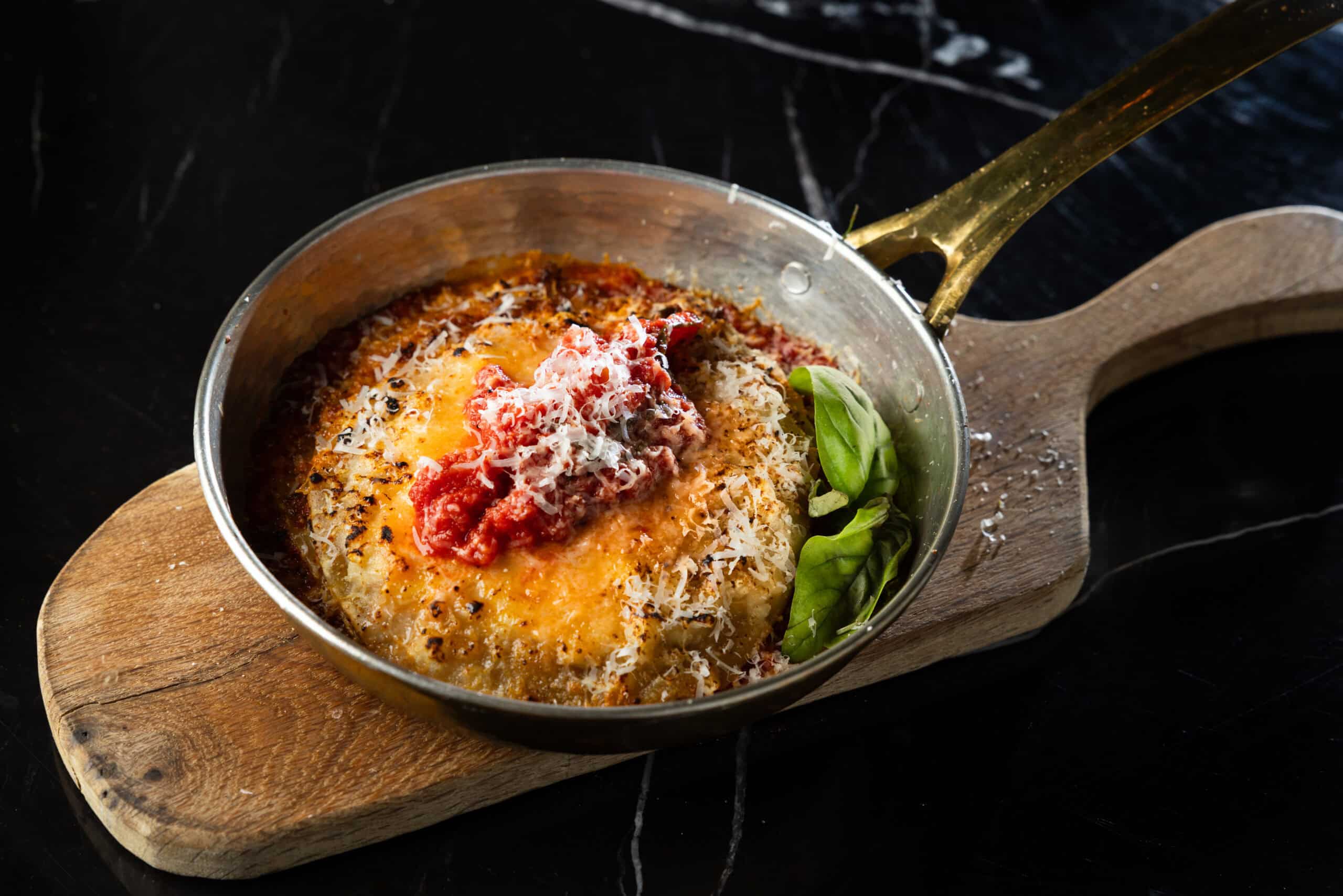 Risotto with parmesan served in a pan
