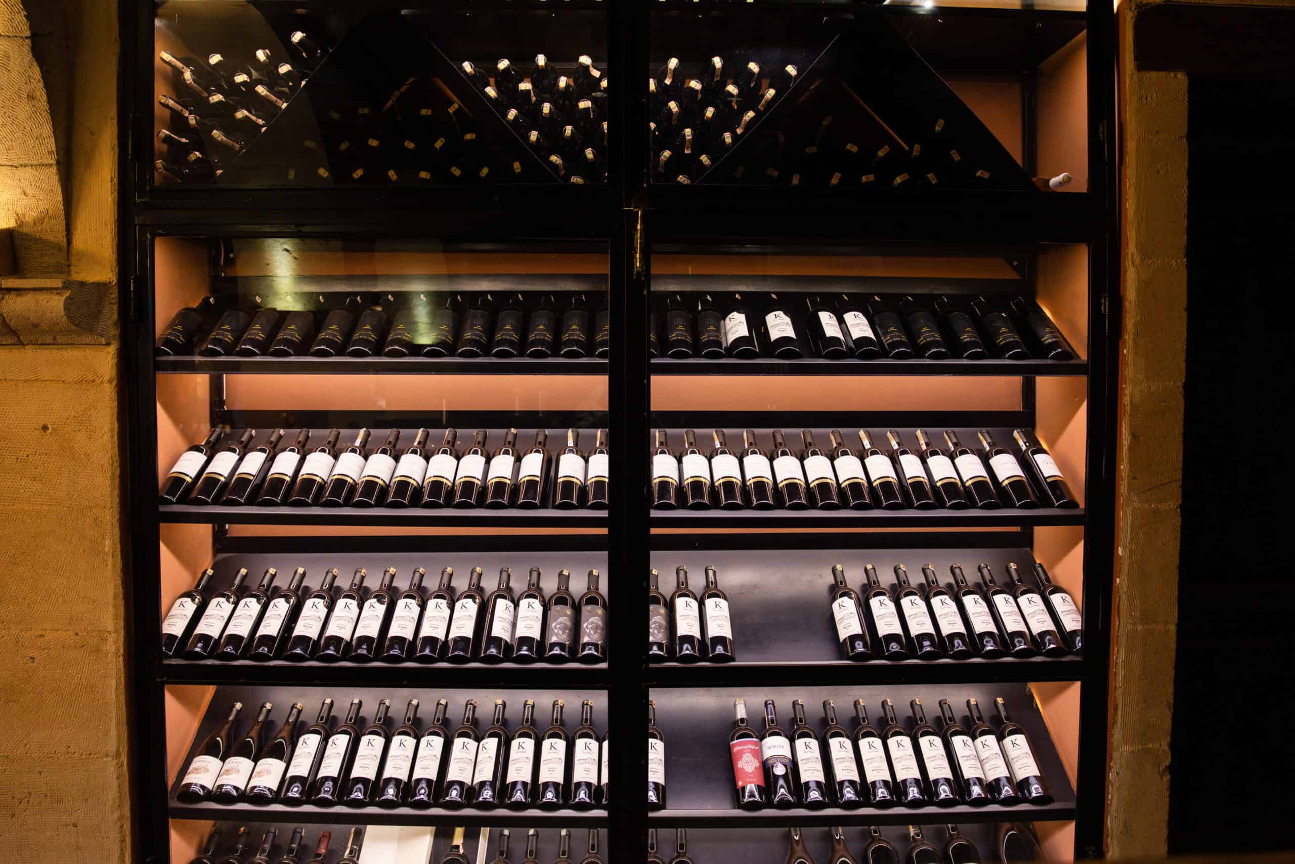 Wine cabinet with bottles of wine