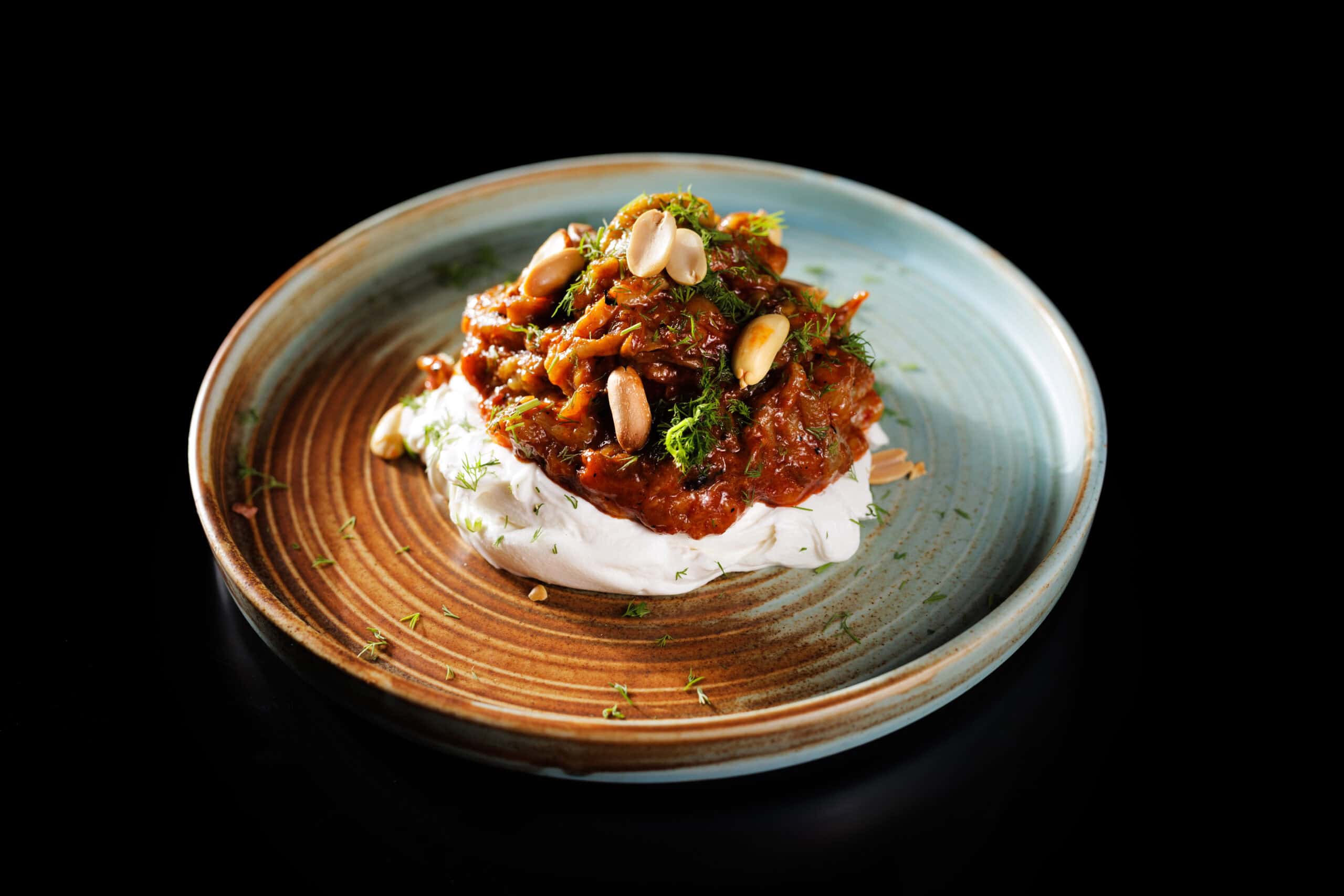 Anatolian dish with yogurt and meat on a ceramic plate