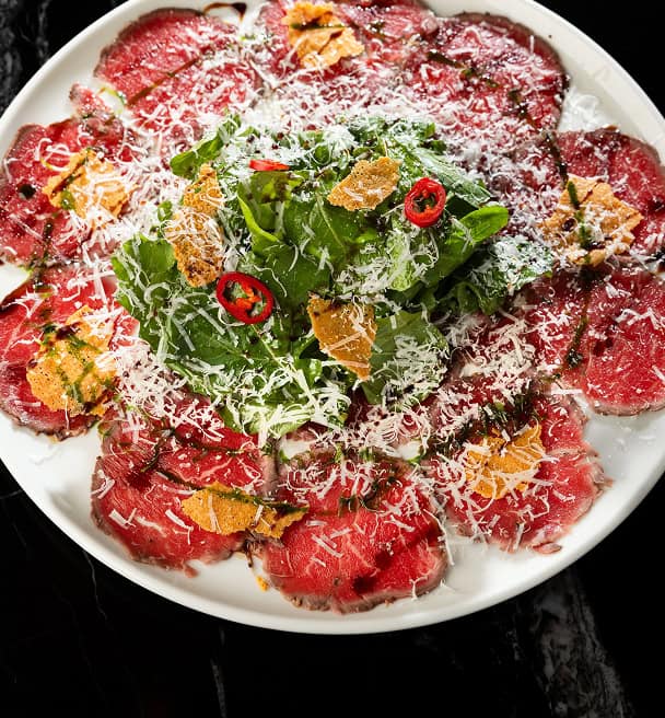 Beef carpaccio with rocket and parmesan